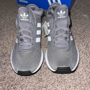 Grey adidas swift runs